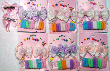 y097 KIDS asst barrette with pony 0